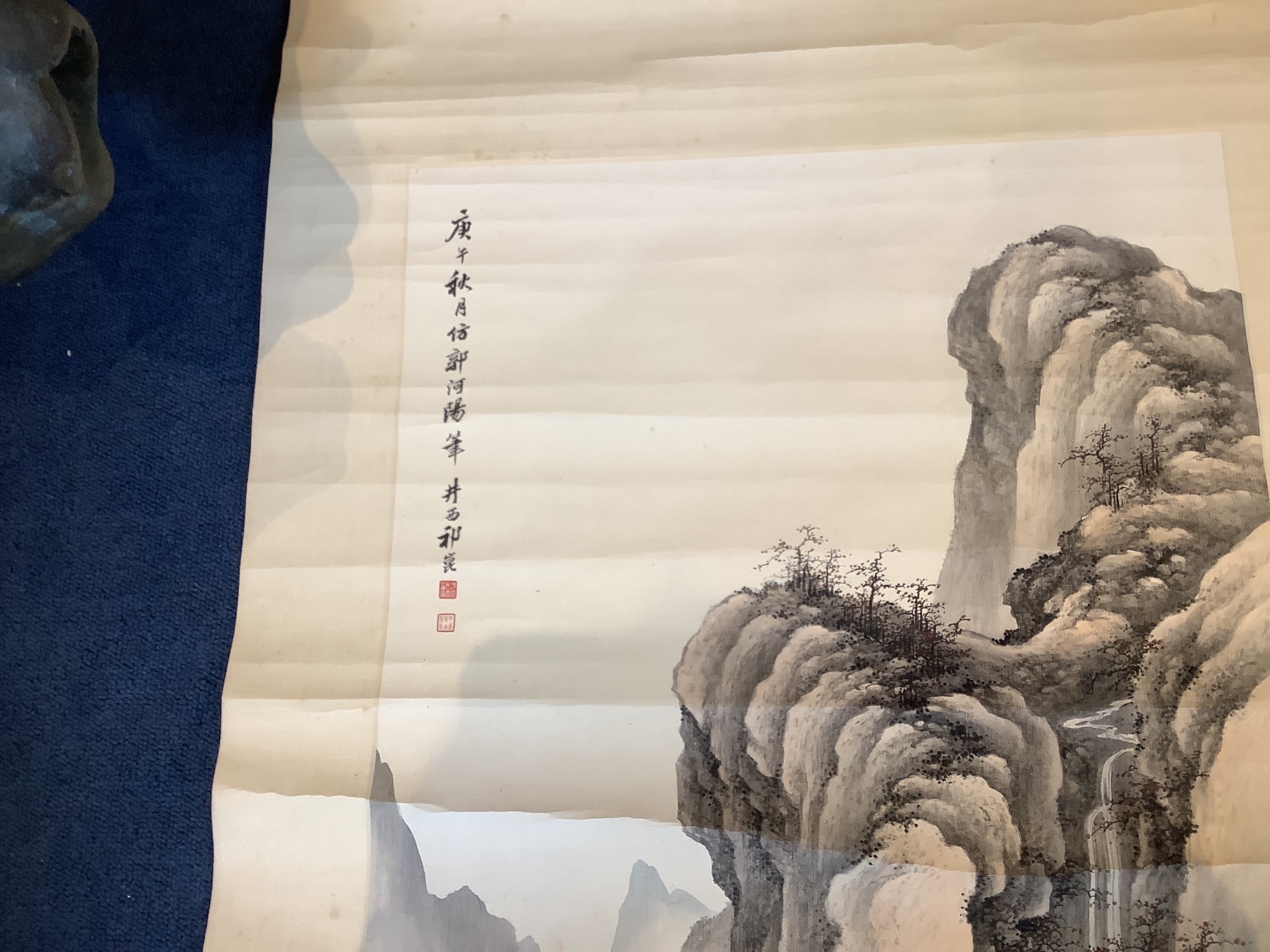 A Chinese scroll painting of a scholar seated in a mountainous river landscape, 20th century Image 94 cm X 45 cm